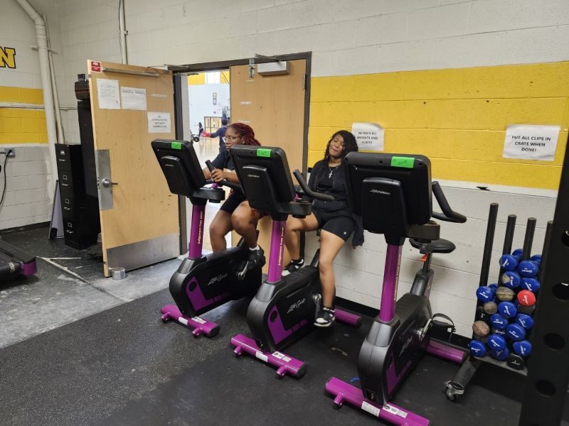 Donated exercise bikes in use at Martin Luther King High School