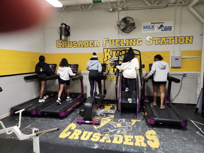 Students training on donated cardio equipment at Martin Luther King High School